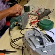 Electric sander being fixed at Tiverton Repair Café